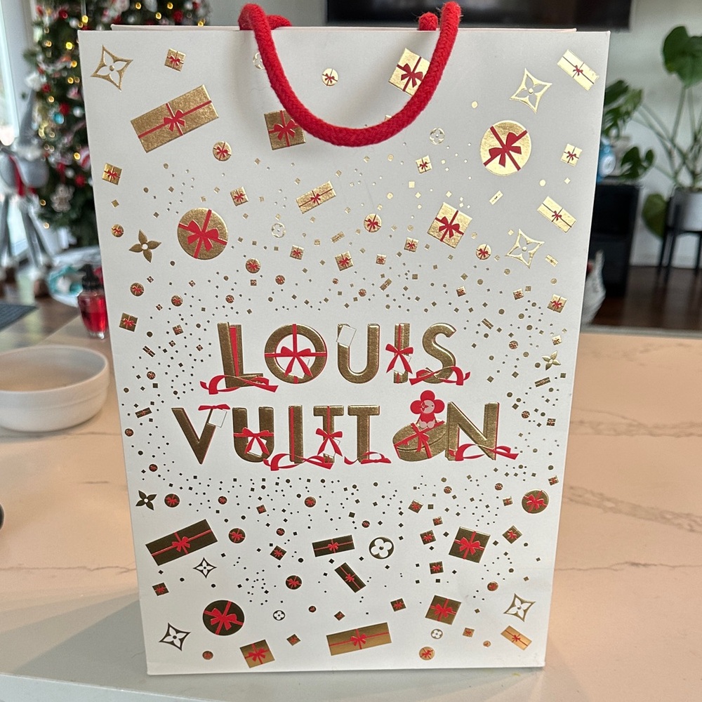 Empty Louis Vuitton 2025 holiday shopping bag